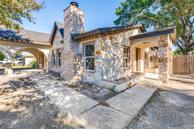 view of front of house with a carport