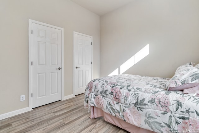 bedroom featuring light wood-type flooring