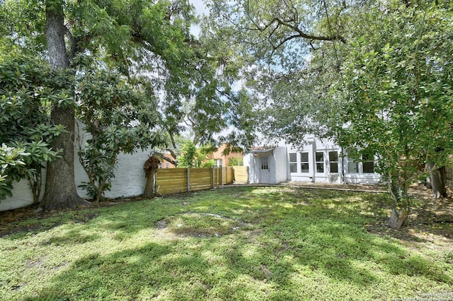 view of yard with fence
