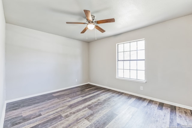 unfurnished room featuring ceiling fan and hardwood / wood-style floors