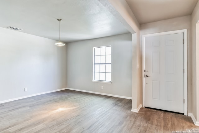 entrance foyer with hardwood / wood-style floors