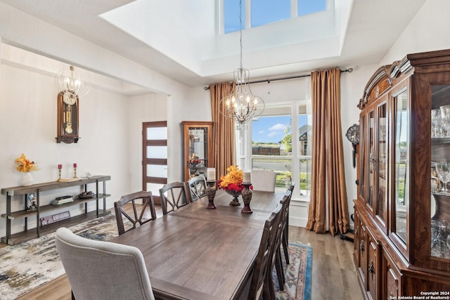 153 W Magnolia Cir, La Vernia, TX 78121 - dining area with a chandelier and wood finished floors