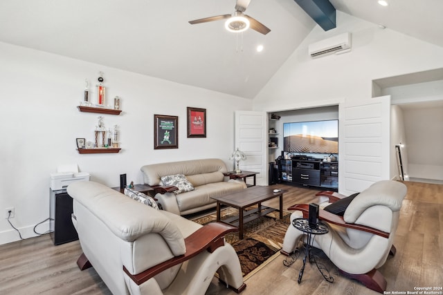 living room featuring hardwood / wood-style floors, ceiling fan, beamed ceiling, high vaulted ceiling, and a wall mounted AC