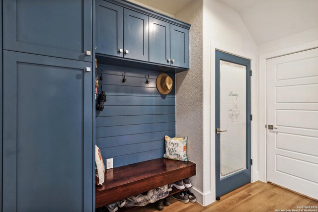 153 W Magnolia Cir, La Vernia, TX 78121 - mudroom with light wood-style flooring and vaulted ceiling