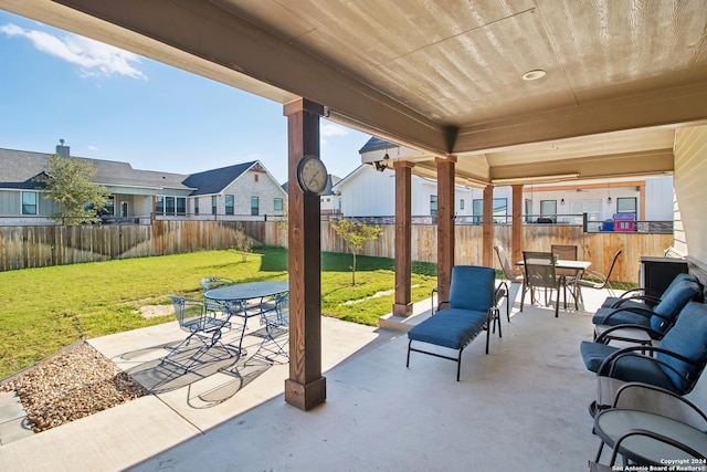 153 W Magnolia Cir, La Vernia, TX 78121 - view of patio / terrace with outdoor dining area and a residential view