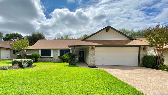 single story home with a front lawn and a garage