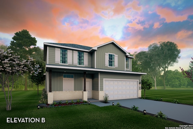 view of front of home with a garage, brick siding, concrete driveway, a front lawn, and board and batten siding