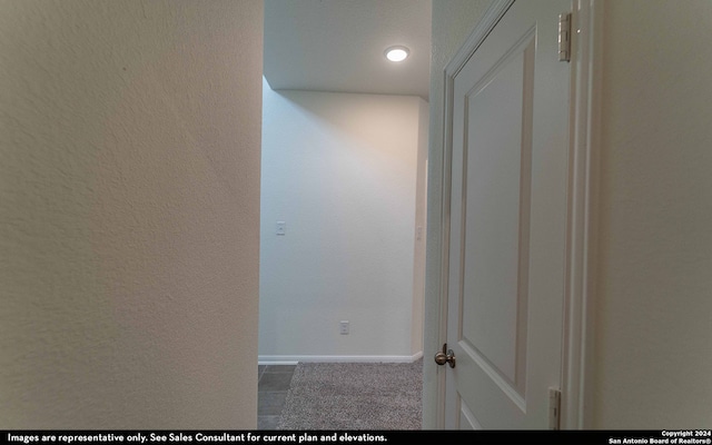 hall featuring tile patterned flooring