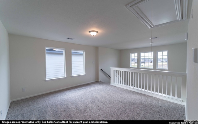 view of carpeted spare room