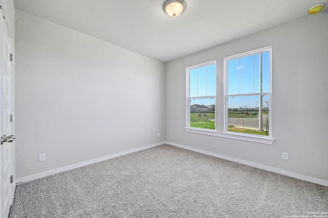 spare room with carpet flooring