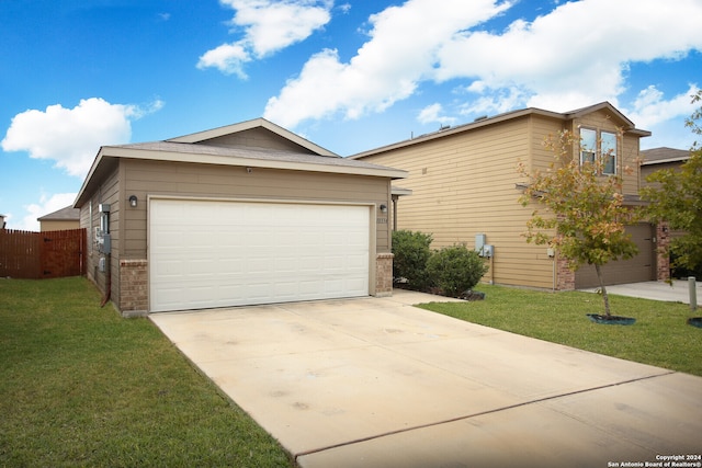 exterior space with a front lawn and a garage