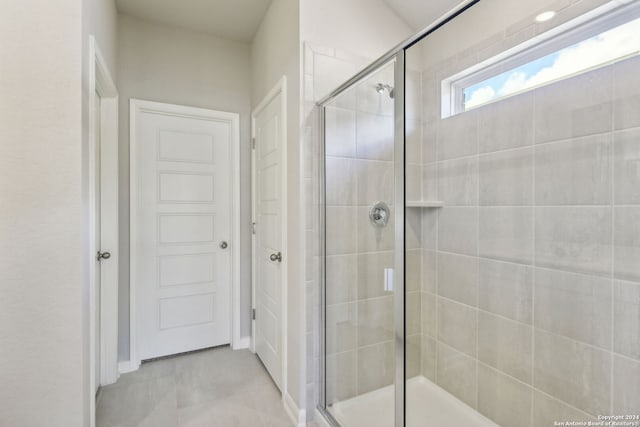 bathroom featuring walk in shower