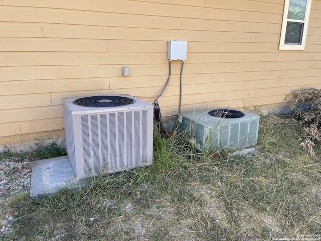 exterior details with central AC and wooden walls