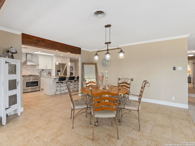 dining space with crown molding