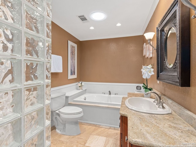 bathroom featuring toilet, crown molding, a tub, and vanity