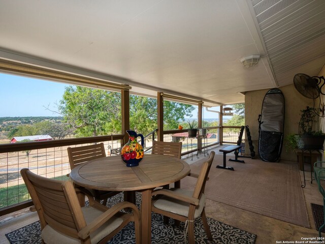 sunroom / solarium with a healthy amount of sunlight