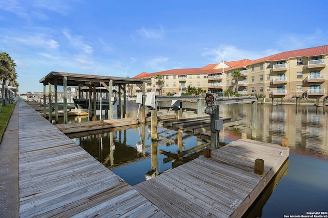 view of dock with a water view