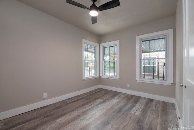 unfurnished room with light hardwood / wood-style floors and ceiling fan