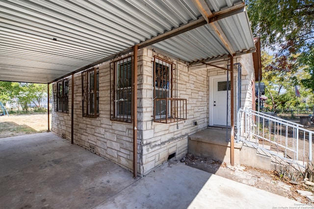 doorway to property featuring a patio