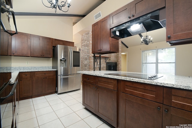 kitchen with black electric stovetop, lofted ceiling, a chandelier, and stainless steel fridge with ice dispenser