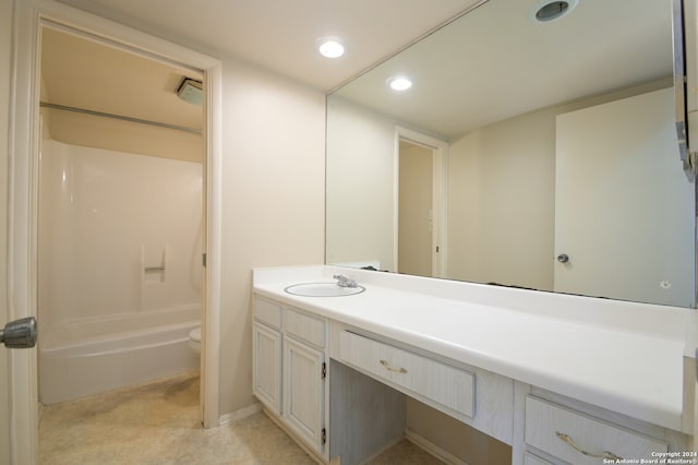 full bathroom featuring toilet, shower / washtub combination, and vanity