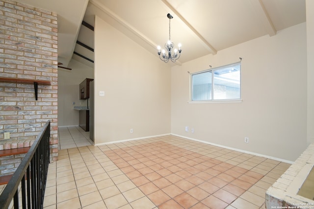 empty room with a chandelier, lofted ceiling with beams, and light tile patterned floors