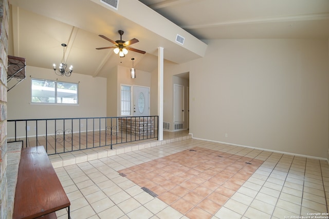 tiled empty room with beamed ceiling, ceiling fan with notable chandelier, and high vaulted ceiling