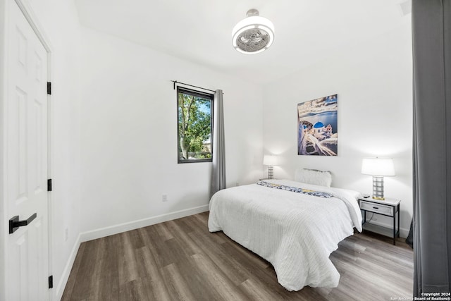 bedroom featuring hardwood / wood-style flooring