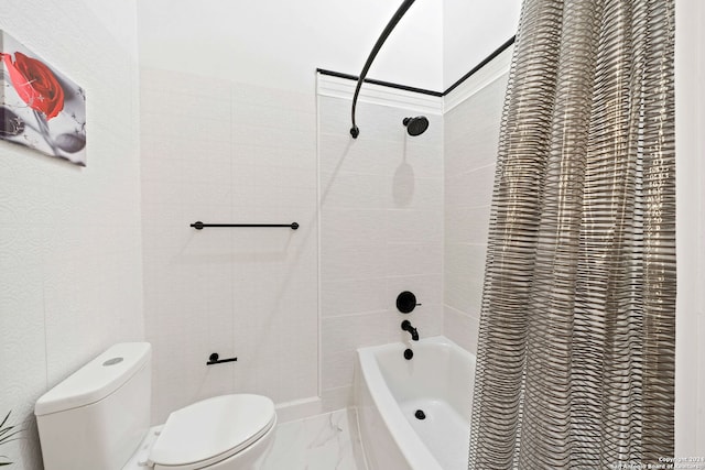 bathroom featuring toilet and shower / bath combo