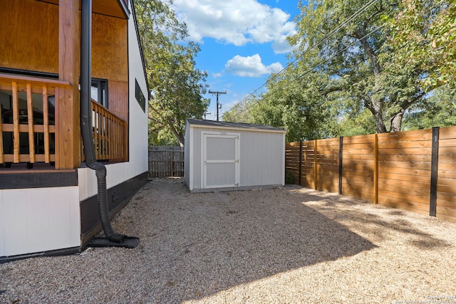 exterior space featuring a storage unit