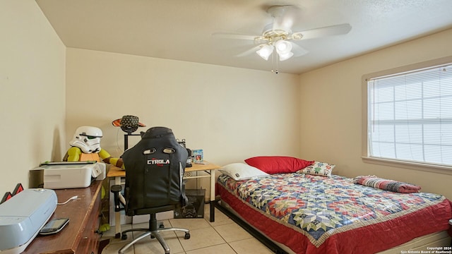 bedroom with light tile patterned floors and ceiling fan