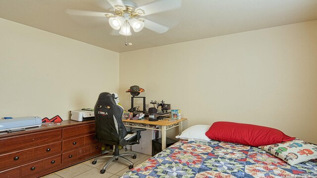 tiled bedroom with ceiling fan