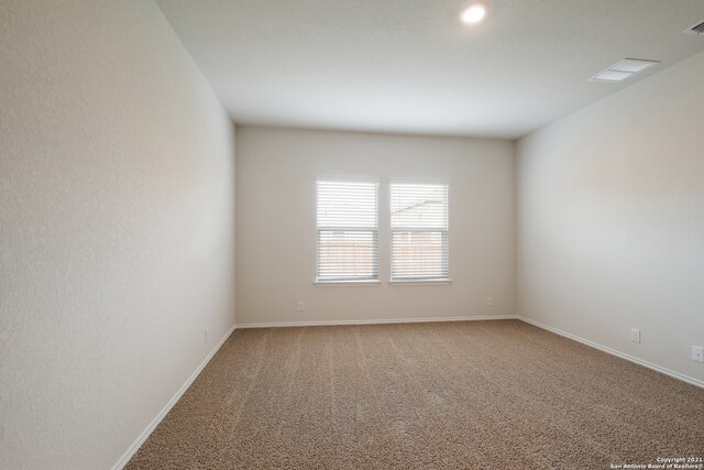 empty room featuring carpet