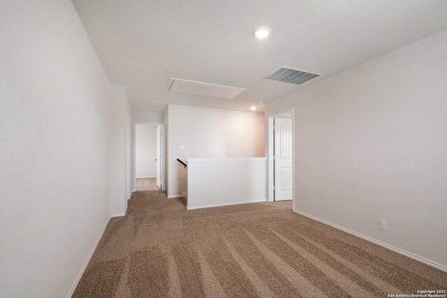 empty room with carpet flooring