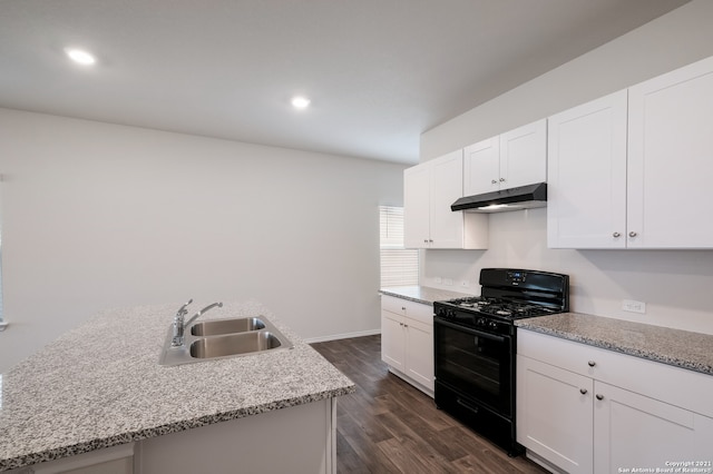 kitchen featuring sink, dark wood-type flooring, white cabinets, and black gas range oven