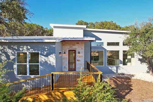 contemporary home featuring a deck