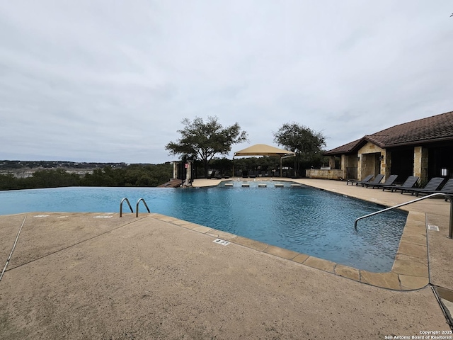 community pool featuring a patio