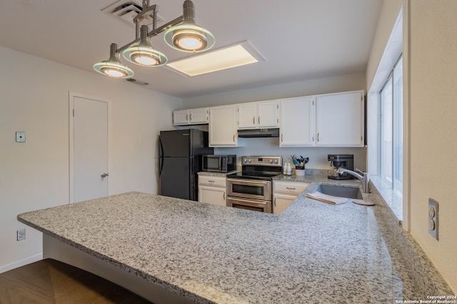 kitchen with light stone countertops, sink, kitchen peninsula, white cabinetry, and stainless steel appliances