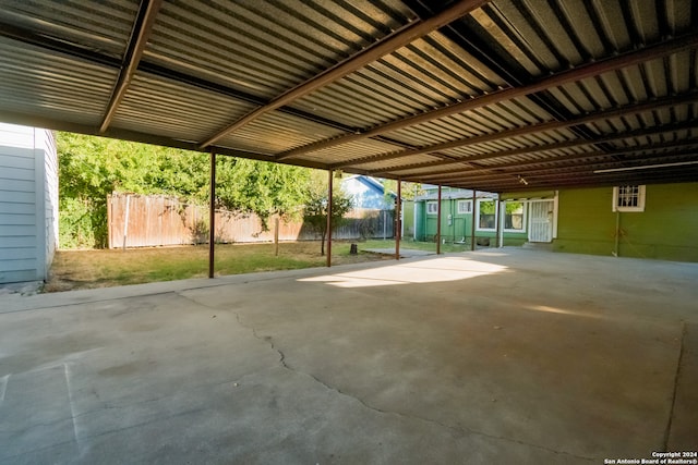 view of patio with a storage unit