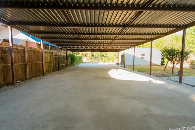 exterior space with a carport