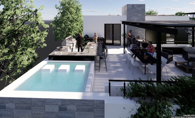 view of swimming pool featuring a patio area and grilling area