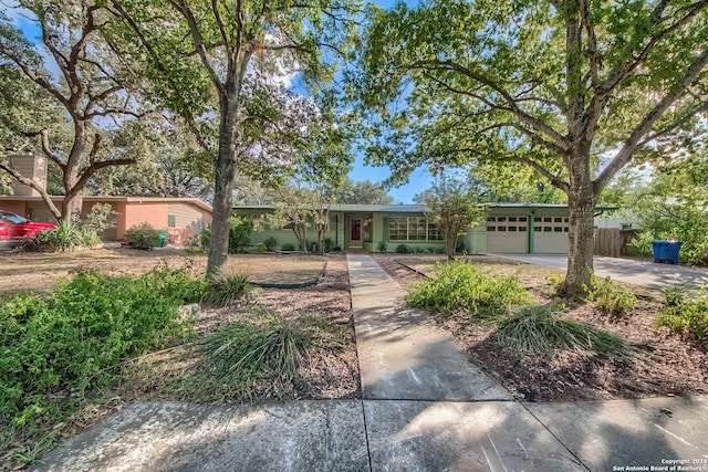 single story home with a garage