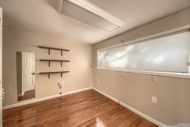 unfurnished room featuring wood-type flooring