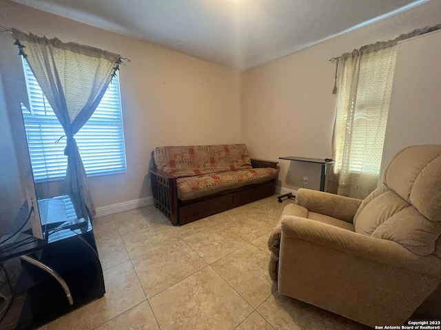 sitting room featuring light tile patterned floors