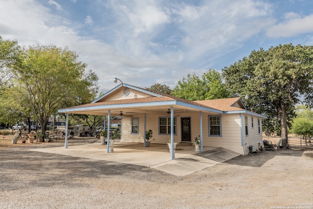 view of front of house with a patio and ceiling fan