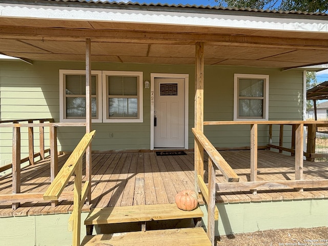 wooden terrace featuring a porch