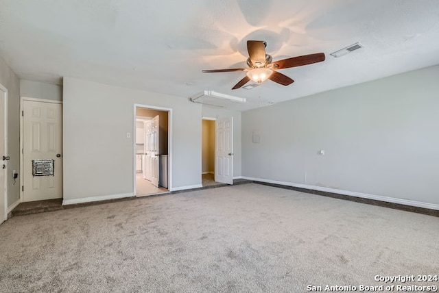 unfurnished bedroom with light carpet and ceiling fan