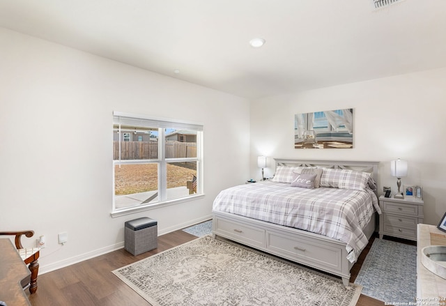 bedroom featuring hardwood / wood-style flooring