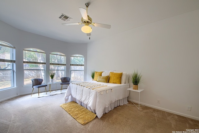 bedroom with ceiling fan and carpet