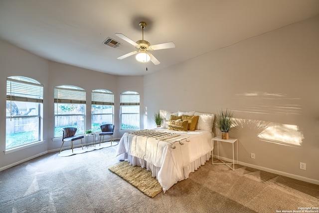 carpeted bedroom with ceiling fan